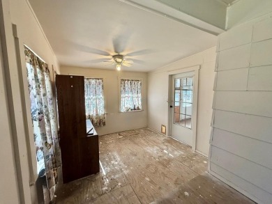 Discover the potential of this cozy 2-bed, 2-bath home in the on Pendleton Harbor in Texas - for sale on GolfHomes.com, golf home, golf lot