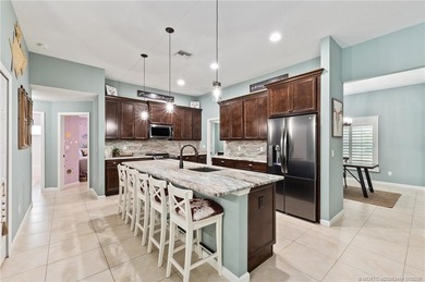 Every day is a vacation in this custom CBS 4 bedroom, 4.5 bath on The Cape Club of Palm City in Florida - for sale on GolfHomes.com, golf home, golf lot