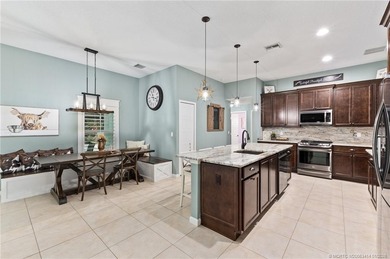 Every day is a vacation in this custom CBS 4 bedroom, 4.5 bath on The Cape Club of Palm City in Florida - for sale on GolfHomes.com, golf home, golf lot