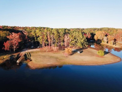 Discover the potential of this cozy 2-bed, 2-bath home in the on Pendleton Harbor in Texas - for sale on GolfHomes.com, golf home, golf lot