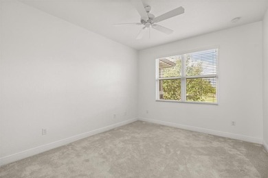 Stunning 4-bedroom, 4-bath home in the exclusive Eagle Creek on Eagle Creek Golf Club in Florida - for sale on GolfHomes.com, golf home, golf lot