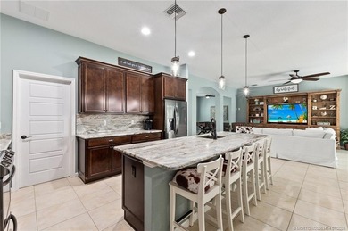 Every day is a vacation in this custom CBS 4 bedroom, 4.5 bath on The Cape Club of Palm City in Florida - for sale on GolfHomes.com, golf home, golf lot
