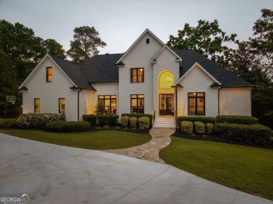 Welcome to luxury living on the largest lot in Riverwood on Champions Retreat Golf Club in Georgia - for sale on GolfHomes.com, golf home, golf lot