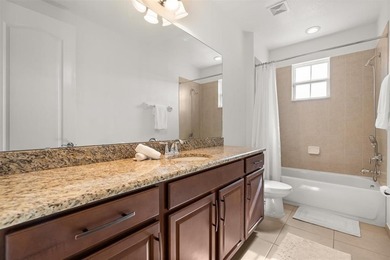 Stunning 4-bedroom, 4-bath home in the exclusive Eagle Creek on Eagle Creek Golf Club in Florida - for sale on GolfHomes.com, golf home, golf lot