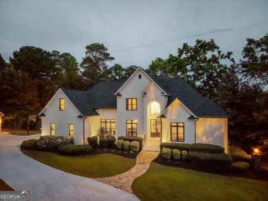 Welcome to luxury living on the largest lot in Riverwood on Champions Retreat Golf Club in Georgia - for sale on GolfHomes.com, golf home, golf lot