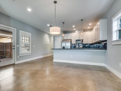 Experience effortless living in this turnkey, energy-efficient on Stevens Park Golf Course in Texas - for sale on GolfHomes.com, golf home, golf lot