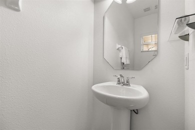 Stunning 4-bedroom, 4-bath home in the exclusive Eagle Creek on Eagle Creek Golf Club in Florida - for sale on GolfHomes.com, golf home, golf lot