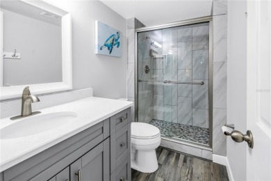 Experience refined Florida living in this exceptional, move-in on Feather Sound Country Club in Florida - for sale on GolfHomes.com, golf home, golf lot