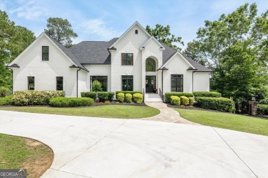 Welcome to luxury living on the largest lot in Riverwood on Champions Retreat Golf Club in Georgia - for sale on GolfHomes.com, golf home, golf lot