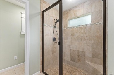 Every day is a vacation in this custom CBS 4 bedroom, 4.5 bath on The Cape Club of Palm City in Florida - for sale on GolfHomes.com, golf home, golf lot