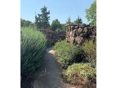 Experience effortless living in this turnkey, energy-efficient on Stevens Park Golf Course in Texas - for sale on GolfHomes.com, golf home, golf lot