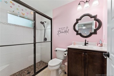 Every day is a vacation in this custom CBS 4 bedroom, 4.5 bath on The Cape Club of Palm City in Florida - for sale on GolfHomes.com, golf home, golf lot