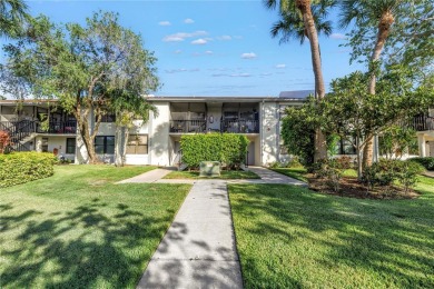 Experience refined Florida living in this exceptional, move-in on Feather Sound Country Club in Florida - for sale on GolfHomes.com, golf home, golf lot