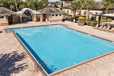 Stunning 4-bedroom, 4-bath home in the exclusive Eagle Creek on Eagle Creek Golf Club in Florida - for sale on GolfHomes.com, golf home, golf lot