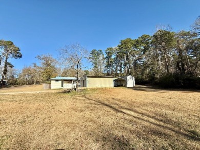 Discover the potential of this cozy 2-bed, 2-bath home in the on Pendleton Harbor in Texas - for sale on GolfHomes.com, golf home, golf lot