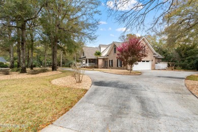 Don't miss your chance to own this beautiful 2,600-square-foot on Sea Trail Golf Resort in North Carolina - for sale on GolfHomes.com, golf home, golf lot