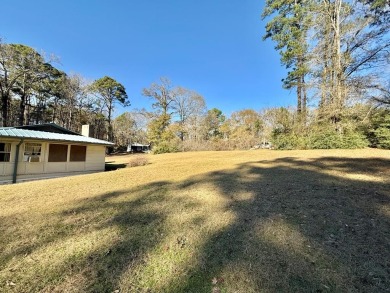 Discover the potential of this cozy 2-bed, 2-bath home in the on Pendleton Harbor in Texas - for sale on GolfHomes.com, golf home, golf lot