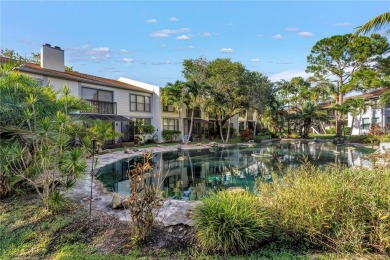 Experience refined Florida living in this exceptional, move-in on Feather Sound Country Club in Florida - for sale on GolfHomes.com, golf home, golf lot