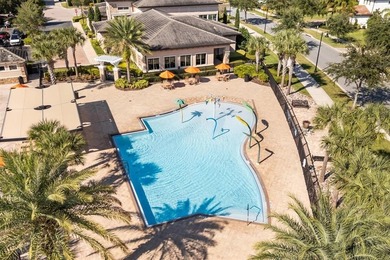 Stunning 4-bedroom, 4-bath home in the exclusive Eagle Creek on Eagle Creek Golf Club in Florida - for sale on GolfHomes.com, golf home, golf lot