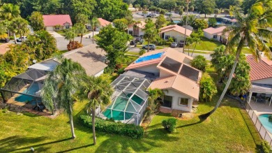 Opportunity Knocks! Discover the potential in this 3-bedroom on Boca Greens Country Club in Florida - for sale on GolfHomes.com, golf home, golf lot