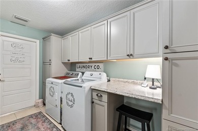 Every day is a vacation in this custom CBS 4 bedroom, 4.5 bath on The Cape Club of Palm City in Florida - for sale on GolfHomes.com, golf home, golf lot