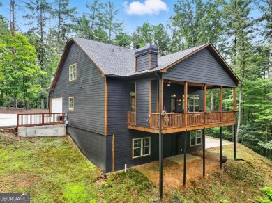 This stunning 4-bedroom, 4-bath home offers the perfect blend of on White Path Golf Club in Georgia - for sale on GolfHomes.com, golf home, golf lot