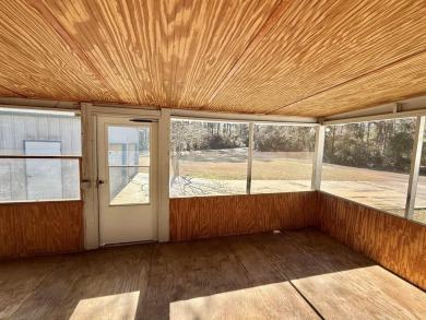 Discover the potential of this cozy 2-bed, 2-bath home in the on Pendleton Harbor in Texas - for sale on GolfHomes.com, golf home, golf lot