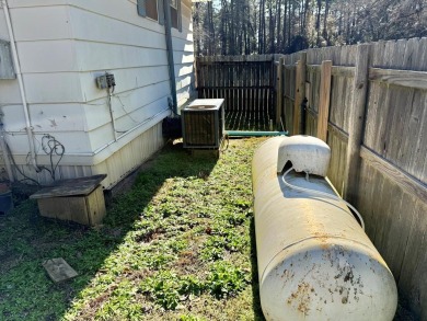 Discover the potential of this cozy 2-bed, 2-bath home in the on Pendleton Harbor in Texas - for sale on GolfHomes.com, golf home, golf lot