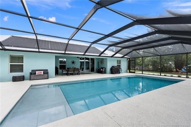 Every day is a vacation in this custom CBS 4 bedroom, 4.5 bath on The Cape Club of Palm City in Florida - for sale on GolfHomes.com, golf home, golf lot
