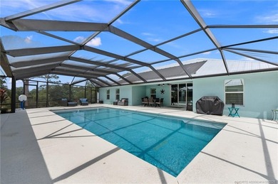 Every day is a vacation in this custom CBS 4 bedroom, 4.5 bath on The Cape Club of Palm City in Florida - for sale on GolfHomes.com, golf home, golf lot