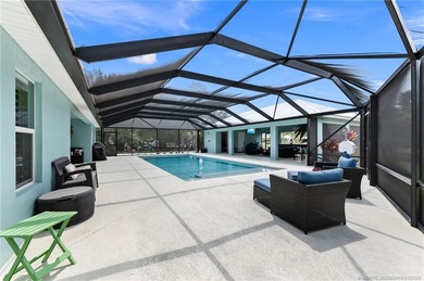 Every day is a vacation in this custom CBS 4 bedroom, 4.5 bath on The Cape Club of Palm City in Florida - for sale on GolfHomes.com, golf home, golf lot