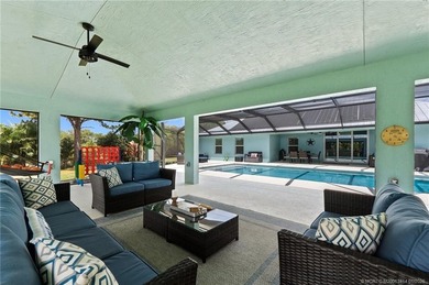 Every day is a vacation in this custom CBS 4 bedroom, 4.5 bath on The Cape Club of Palm City in Florida - for sale on GolfHomes.com, golf home, golf lot
