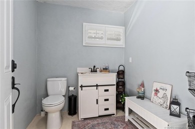 Every day is a vacation in this custom CBS 4 bedroom, 4.5 bath on The Cape Club of Palm City in Florida - for sale on GolfHomes.com, golf home, golf lot