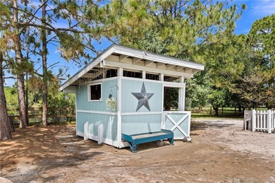 Every day is a vacation in this custom CBS 4 bedroom, 4.5 bath on The Cape Club of Palm City in Florida - for sale on GolfHomes.com, golf home, golf lot