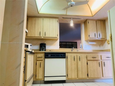 Charming and roomy 2 bedroom 2 bath condo with enclosed porch on Oriole Golf and Tennis Club in Florida - for sale on GolfHomes.com, golf home, golf lot