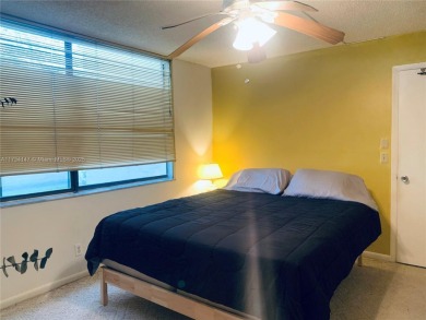 Charming and roomy 2 bedroom 2 bath condo with enclosed porch on Oriole Golf and Tennis Club in Florida - for sale on GolfHomes.com, golf home, golf lot