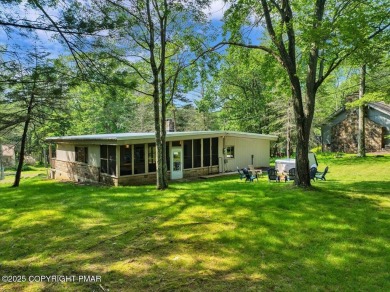 Step into this 3-bedroom, 2-bath Lake Harmony home showcasing on Split Rock Resort and Country Club in Pennsylvania - for sale on GolfHomes.com, golf home, golf lot