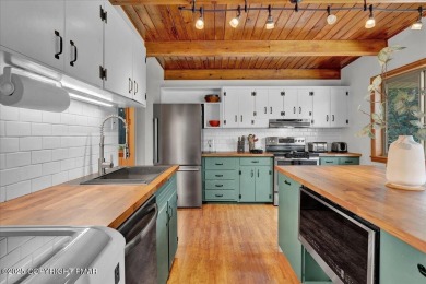 Step into this 3-bedroom, 2-bath Lake Harmony home showcasing on Split Rock Resort and Country Club in Pennsylvania - for sale on GolfHomes.com, golf home, golf lot