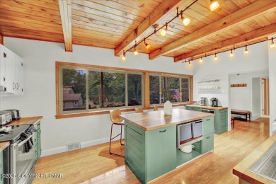 Step into this 3-bedroom, 2-bath Lake Harmony home showcasing on Split Rock Resort and Country Club in Pennsylvania - for sale on GolfHomes.com, golf home, golf lot