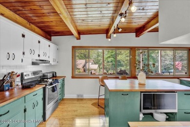 Step into this 3-bedroom, 2-bath Lake Harmony home showcasing on Split Rock Resort and Country Club in Pennsylvania - for sale on GolfHomes.com, golf home, golf lot