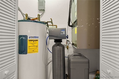 Enjoy peaceful lake living in this beautifully situated on The Club At Old Kinderhook in Missouri - for sale on GolfHomes.com, golf home, golf lot