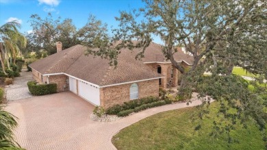 Tucked away among tree-lined streets and mature landscaping in on River Wilderness Golf and Country Club in Florida - for sale on GolfHomes.com, golf home, golf lot