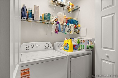 Enjoy peaceful lake living in this beautifully situated on The Club At Old Kinderhook in Missouri - for sale on GolfHomes.com, golf home, golf lot