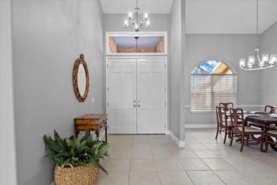 Tucked away among tree-lined streets and mature landscaping in on River Wilderness Golf and Country Club in Florida - for sale on GolfHomes.com, golf home, golf lot