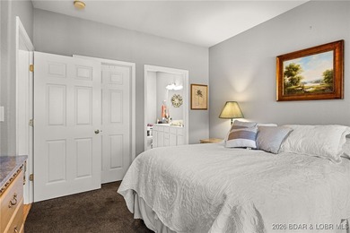 Enjoy peaceful lake living in this beautifully situated on The Club At Old Kinderhook in Missouri - for sale on GolfHomes.com, golf home, golf lot