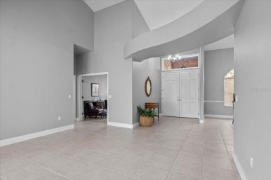 Tucked away among tree-lined streets and mature landscaping in on River Wilderness Golf and Country Club in Florida - for sale on GolfHomes.com, golf home, golf lot
