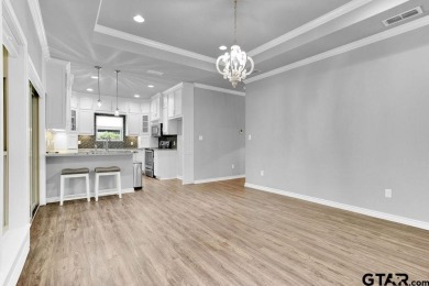 Enjoy resort style living in this beautiful 3-bedroom, 2.5-bath on Hide-A-Way Lake Golf Course in Texas - for sale on GolfHomes.com, golf home, golf lot