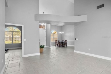 Tucked away among tree-lined streets and mature landscaping in on River Wilderness Golf and Country Club in Florida - for sale on GolfHomes.com, golf home, golf lot