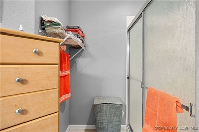 Enjoy peaceful lake living in this beautifully situated on The Club At Old Kinderhook in Missouri - for sale on GolfHomes.com, golf home, golf lot