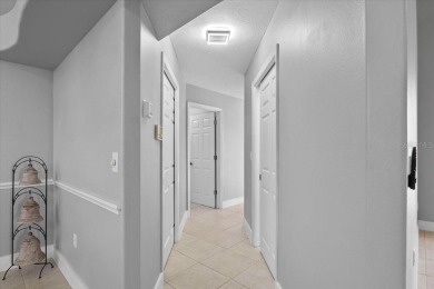 Tucked away among tree-lined streets and mature landscaping in on River Wilderness Golf and Country Club in Florida - for sale on GolfHomes.com, golf home, golf lot